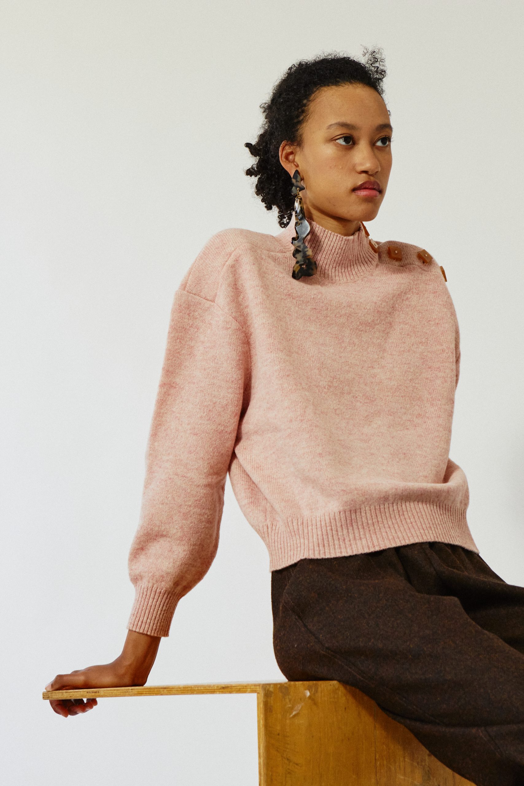 button shoulder sweater